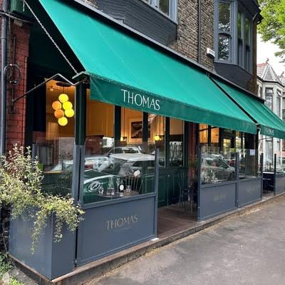 The exterior of Thomas restaurant