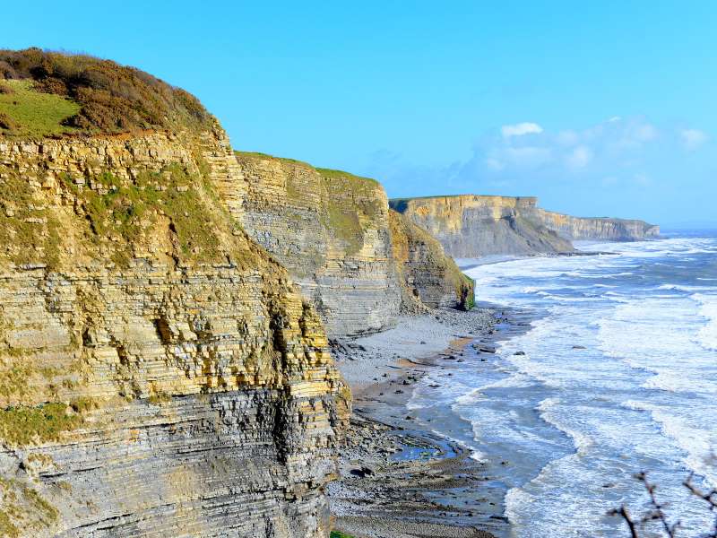 Layered limestone cliffs along the Heritage Coast near Southerndown